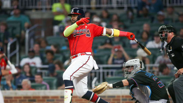 Sep 2, 2022; Atlanta, Georgia, USA; Atlanta Braves left fielder Marcell Ozuna (20) hits a single against the Miami Marlins in the fourth inning at Truist Park. Mandatory Credit: Brett Davis-USA TODAY Sports